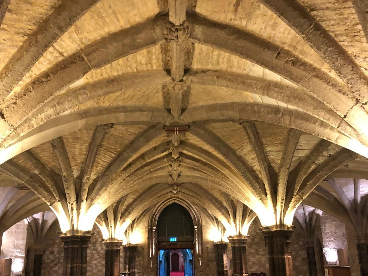 Stone vaulted cellar with feature up-lighting on the columns