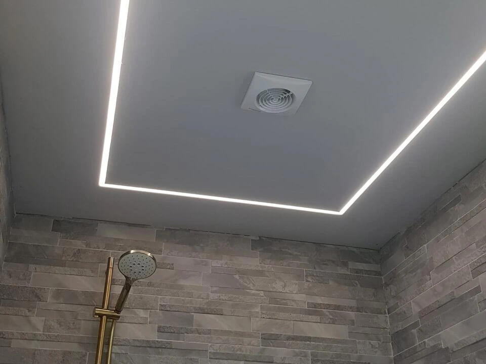 Modern lighting fixtures in a bathroom ceiling